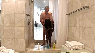 Sexy Black Milf takes a hot steamy shower with white sugar daddy at his penthouse