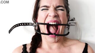 Extreme gag predicament - nailed to the wall